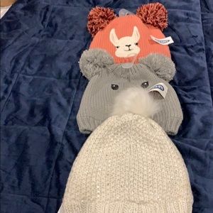 Three babies hats